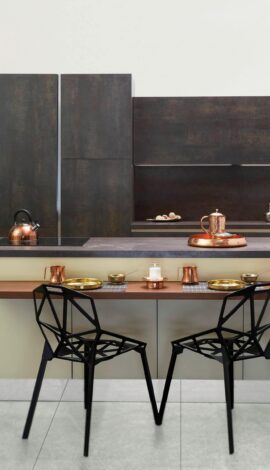 Elegant modern kitchen featuring copper accents and minimalist design.